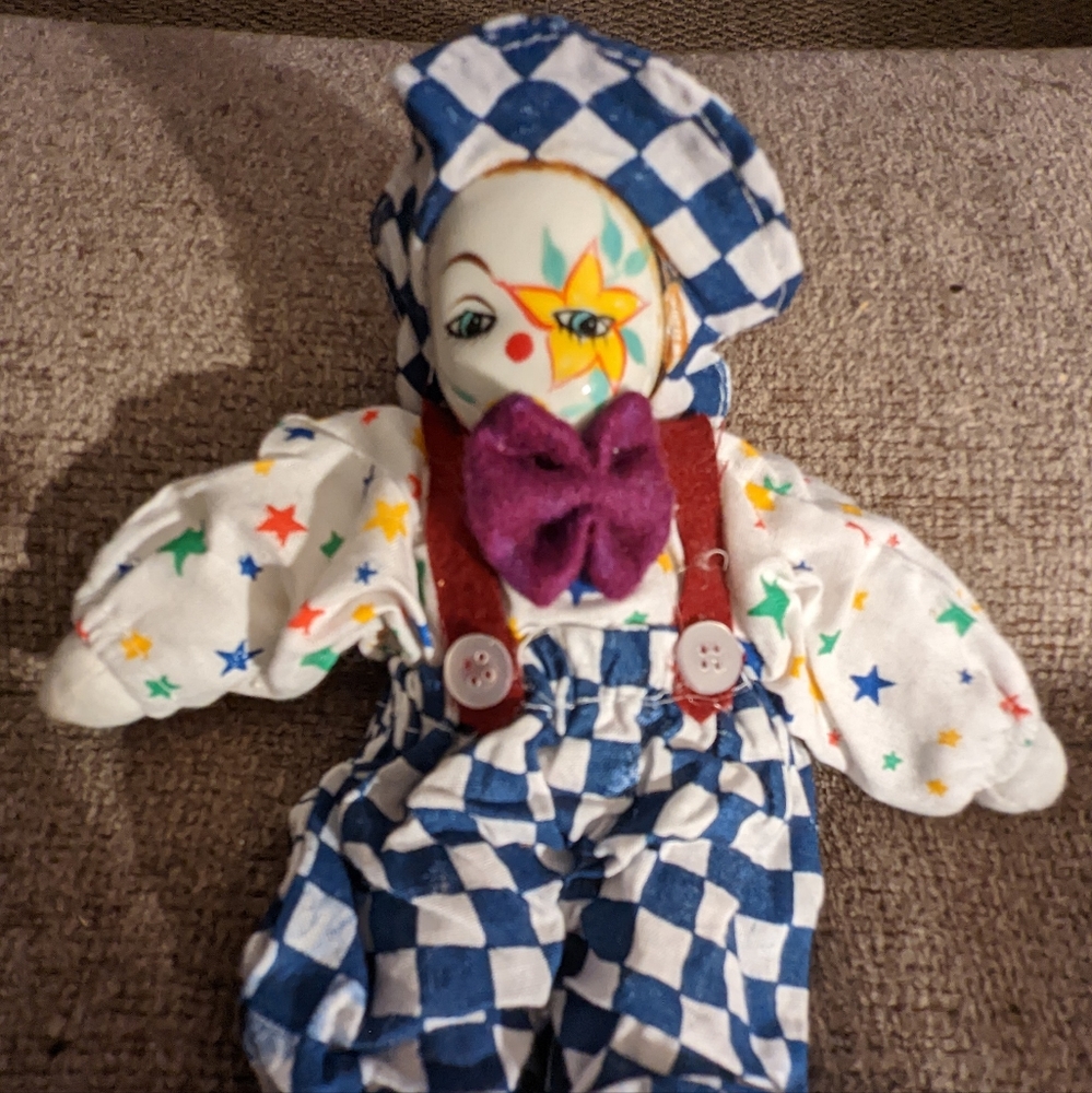 Vintage porcelain clown doll